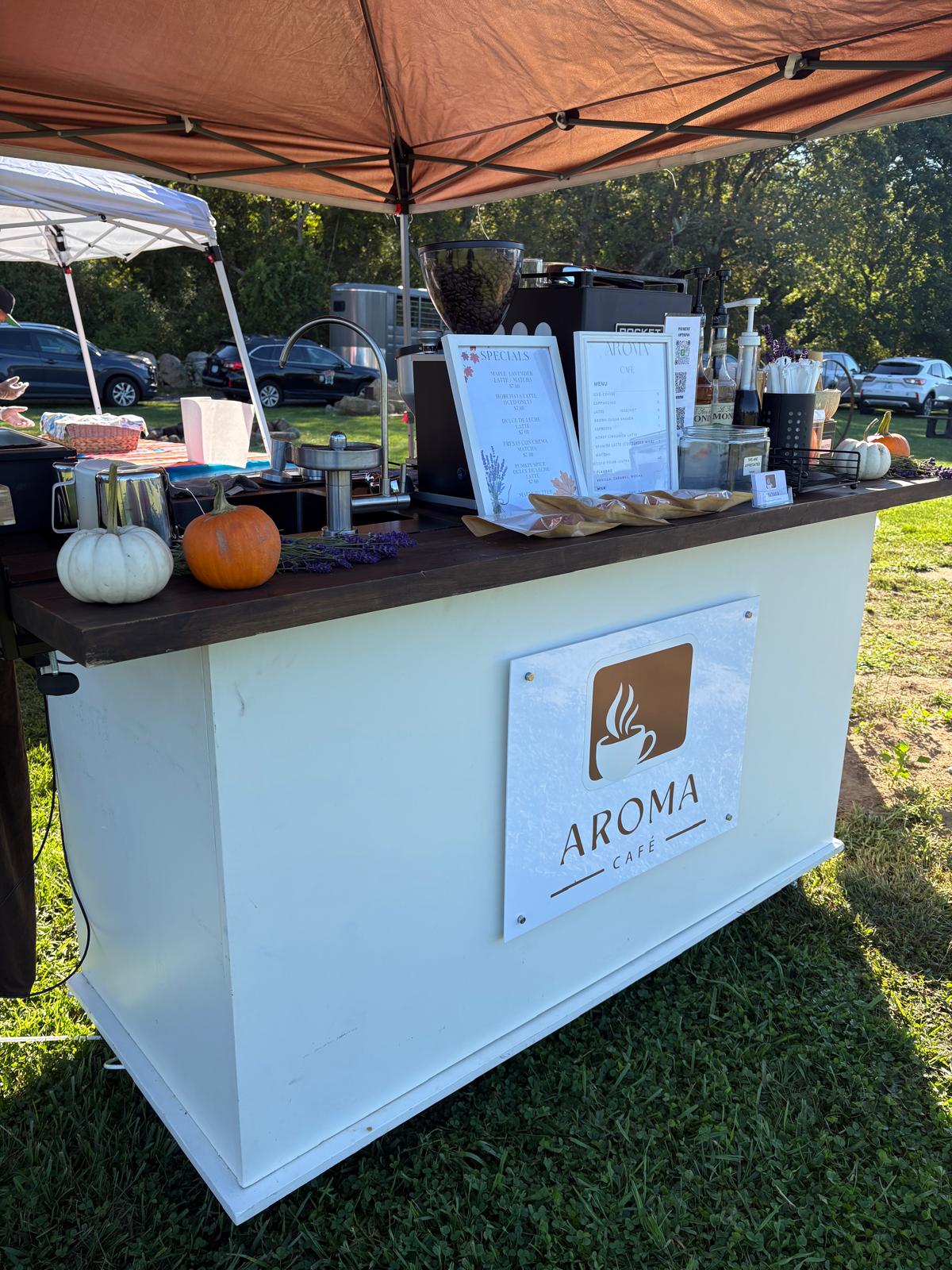 Outdoor autumn cart with pumpkins and specials menu