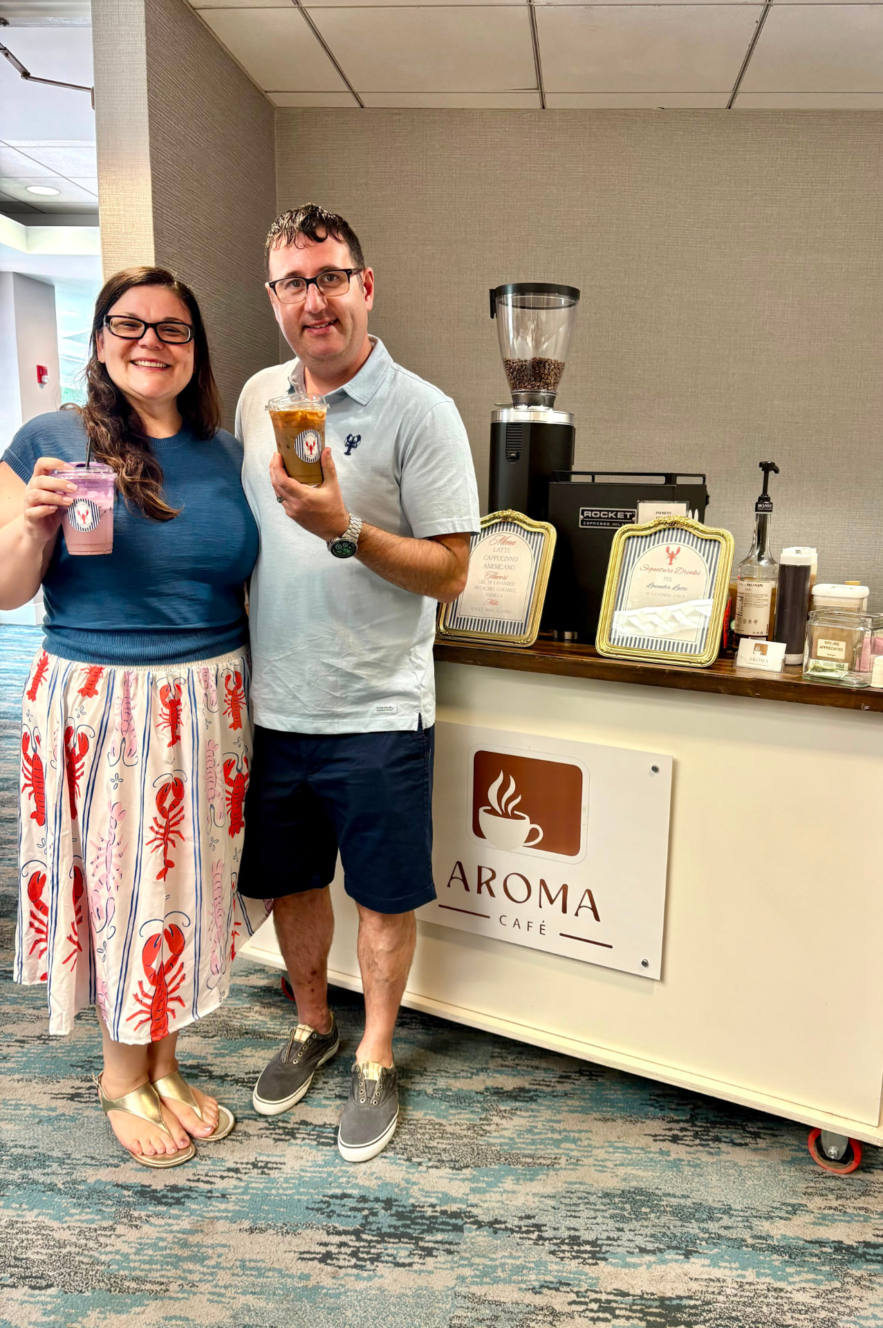Jafet and Stephanie behind the Aroma Café cart
